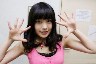 冨手麻妙